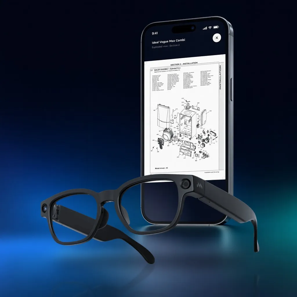 Mentra Live glasses in front of a phone showing an exploded diagram of a boiler
